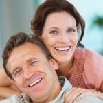 Smiling Couple with Crowns and Bridges Porcelain Crowns and Bridges